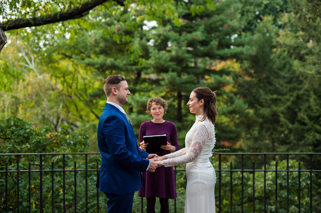 This lacy, long-sleeved wedding gown is so pretty on this bride! And I love blue suits. I love blue anything.